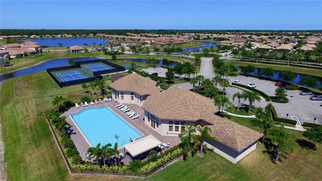 birds eye view of property featuring a water view