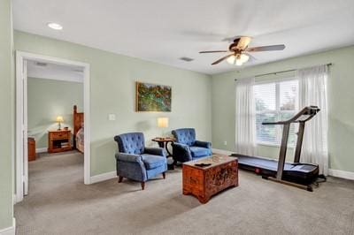 2019 Grey Falcon Cir SW, Vero Beach, FL 32962 - sitting room featuring a ceiling fan, carpet, and baseboards