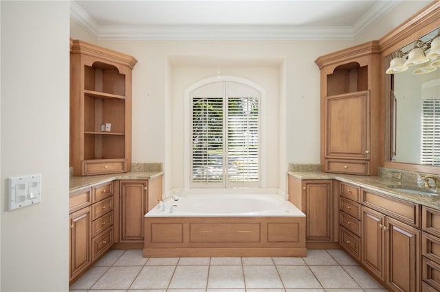 bathroom featuring a bathtub, vanity, tile patterned floors, and ornamental molding