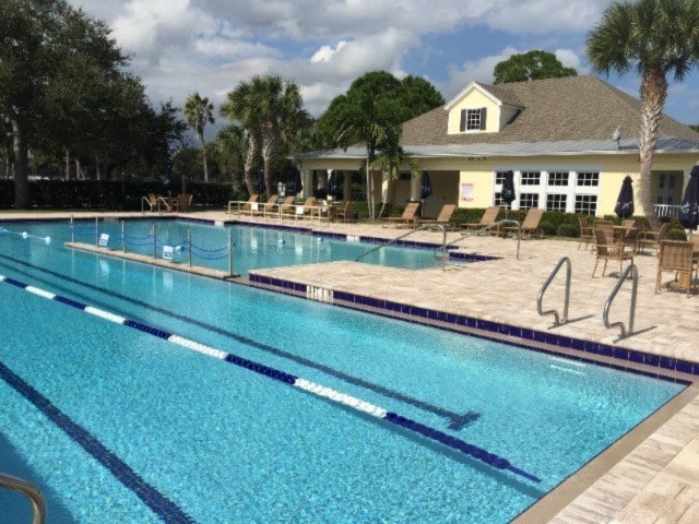 view of swimming pool featuring a patio area