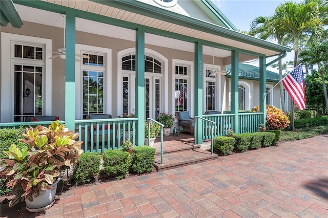 view of exterior entry featuring a porch