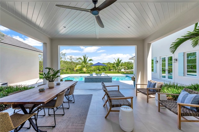 view of patio / terrace featuring ceiling fan