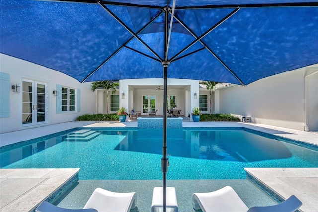 view of swimming pool featuring a patio