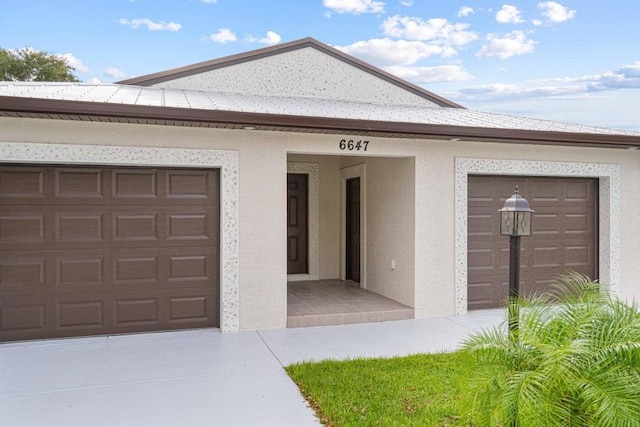 property entrance featuring a garage