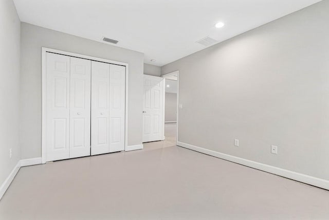 unfurnished bedroom with a closet