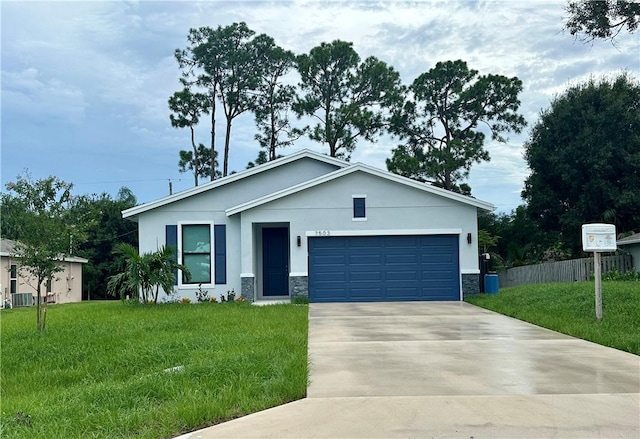 view of front facade with a front lawn and a garage