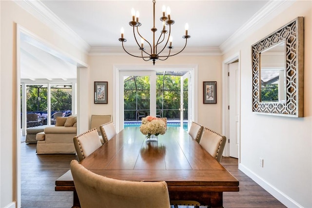 dining room featuring crown molding, plenty of natural light, and dark hardwood / wood-style floors