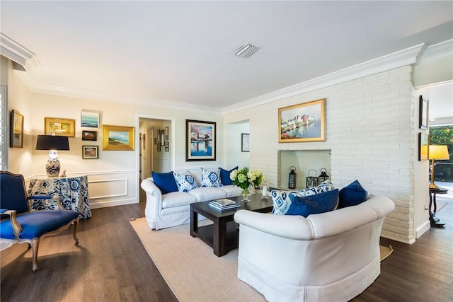 living room featuring crown molding and dark hardwood / wood-style floors