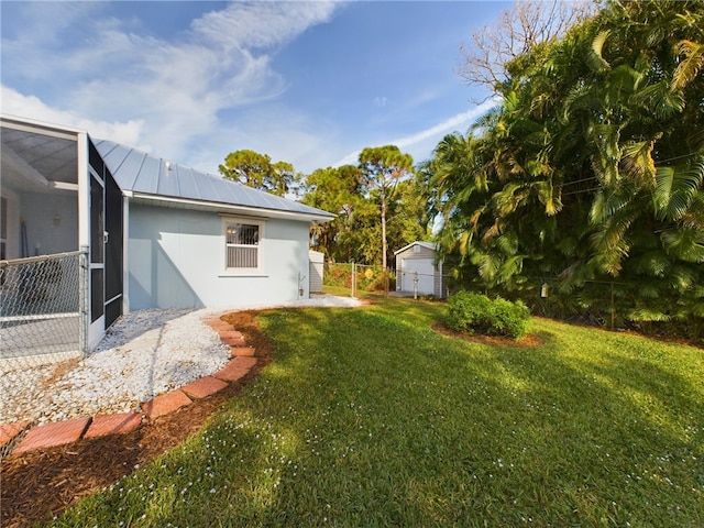 view of yard with a lanai