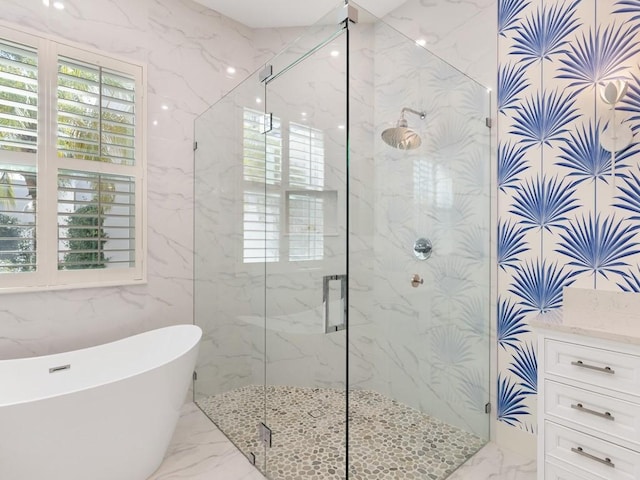 bathroom with separate shower and tub and tile walls