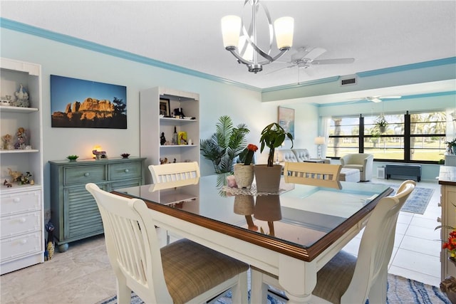 dining space with visible vents, built in shelves, ceiling fan, and crown molding