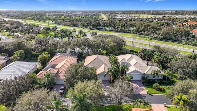 single story home with a garage and a front lawn