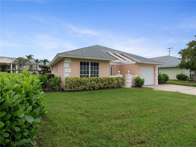 single story home featuring a front yard and a garage