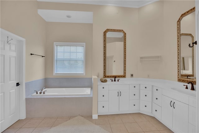 bathroom with vanity, tile patterned floors, and a relaxing tiled tub