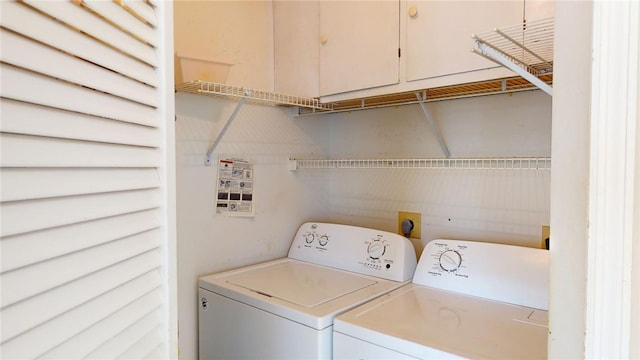 laundry area featuring washing machine and dryer