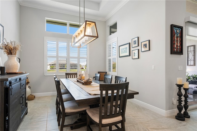 tiled dining room with crown molding