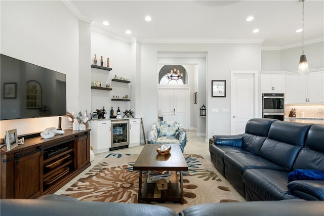 tiled living room featuring bar area, crown molding, and wine cooler