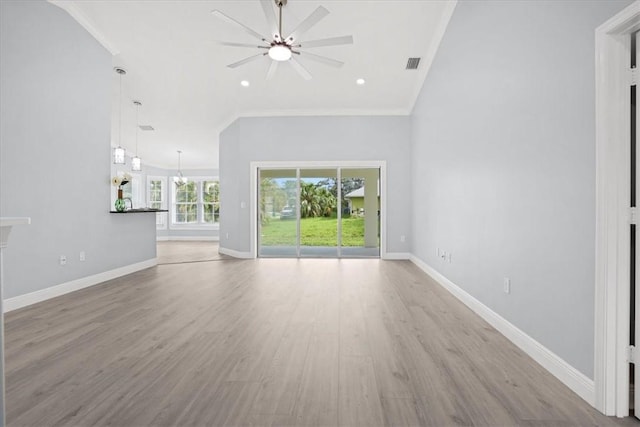 614 Stevenson Ave, Sebastian, FL 32958 - unfurnished living room with ceiling fan, ornamental molding, wood finished floors, and recessed lighting