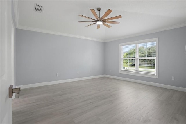 614 Stevenson Ave, Sebastian, FL 32958 - spare room with ornamental molding, ceiling fan, and light wood finished floors