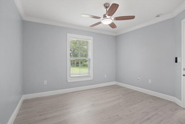 614 Stevenson Ave, Sebastian, FL 32958 - empty room featuring a ceiling fan, light wood-style flooring, and crown molding