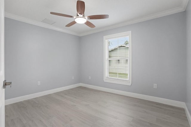 614 Stevenson Ave, Sebastian, FL 32958 - empty room featuring light wood-type flooring, ornamental molding, and a ceiling fan