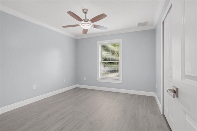 614 Stevenson Ave, Sebastian, FL 32958 - unfurnished room with ornamental molding, a ceiling fan, and light wood-type flooring
