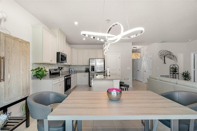 dining room with an inviting chandelier