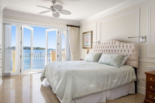 bedroom with ornamental molding, a ceiling fan, and access to outside