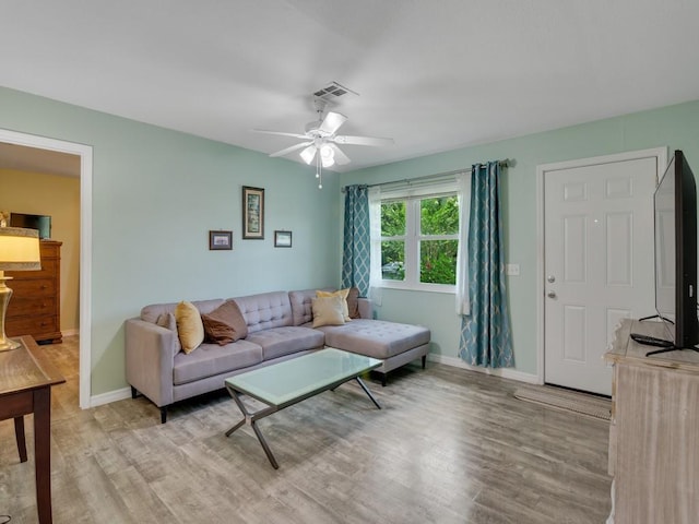 432 Watercrest St, Sebastian, FL 32958 - living room featuring light wood-type flooring and ceiling fan