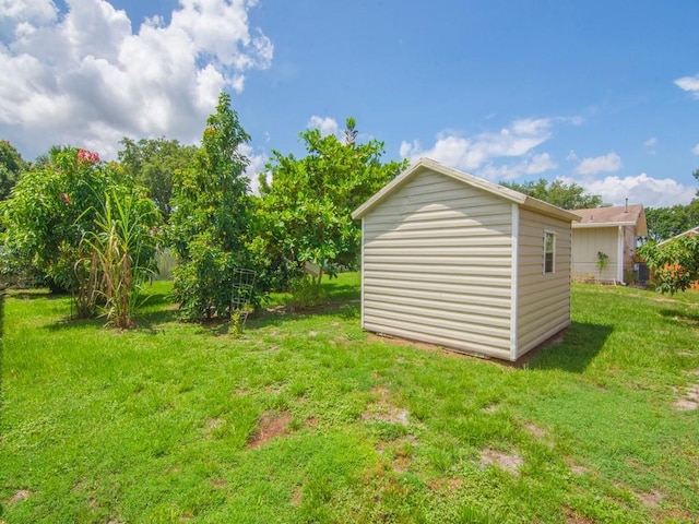 432 Watercrest St, Sebastian, FL 32958 - view of green lawn featuring a storage unit