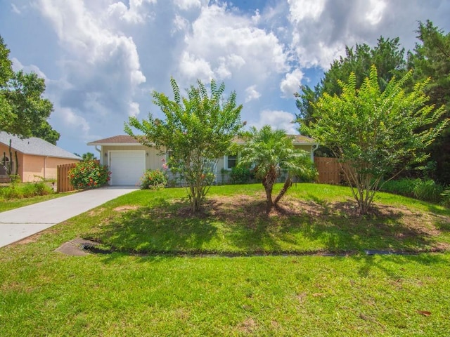 432 Watercrest St, Sebastian, FL 32958 - obstructed view of property featuring concrete driveway and an attached garage