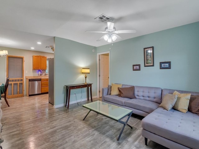 432 Watercrest St, Sebastian, FL 32958 - living room featuring light wood-style floors, ceiling fan, a chandelier, and recessed lighting