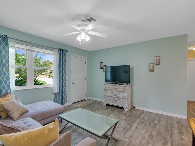 432 Watercrest St, Sebastian, FL 32958 - living area featuring wood finished floors and a ceiling fan