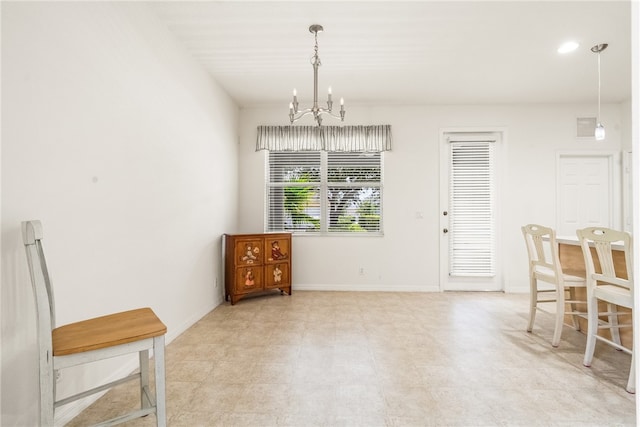 dining room featuring an inviting chandelier