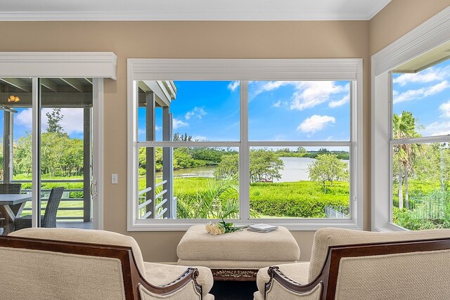 sunroom with a water view