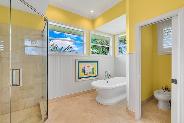 bathroom featuring a bidet, crown molding, and separate shower and tub