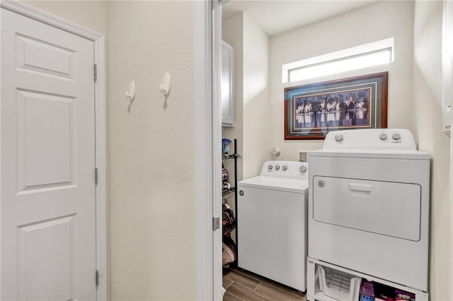 washroom with washer and dryer