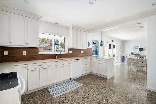 kitchen with dishwasher, range, hanging light fixtures, and tasteful backsplash