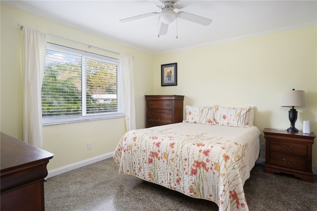 bedroom with ceiling fan and crown molding