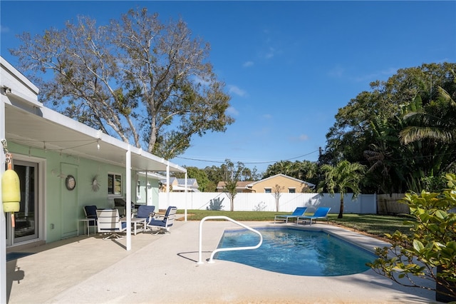 view of pool featuring a patio area