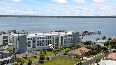 225 Strand Dr Unit 204, Melbourne Beach, FL 32951 - drone / aerial view of a large body of water