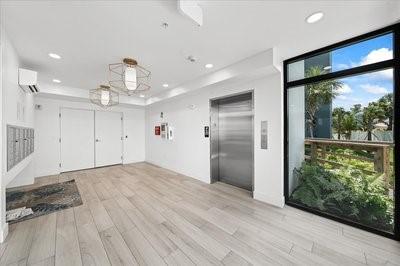 225 Strand Dr Unit 204, Melbourne Beach, FL 32951 - interior space with expansive windows and recessed lighting