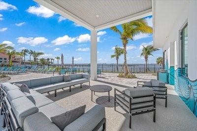 225 Strand Dr Unit 204, Melbourne Beach, FL 32951 - view of patio featuring outdoor lounge area