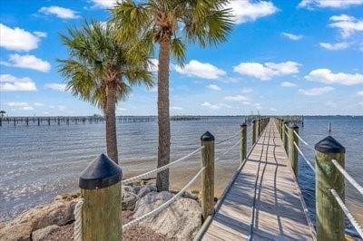 225 Strand Dr Unit 204, Melbourne Beach, FL 32951 - dock area featuring a water view