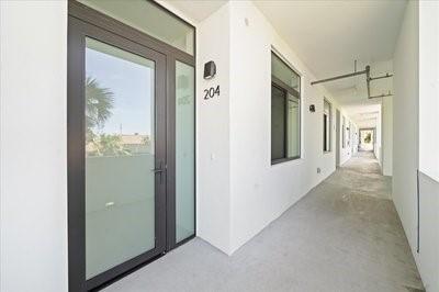 225 Strand Dr Unit 204, Melbourne Beach, FL 32951 - doorway to property featuring a porch