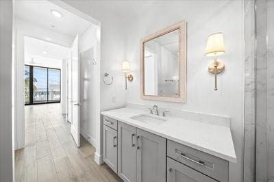 225 Strand Dr Unit 204, Melbourne Beach, FL 32951 - bathroom with vanity and wood finished floors