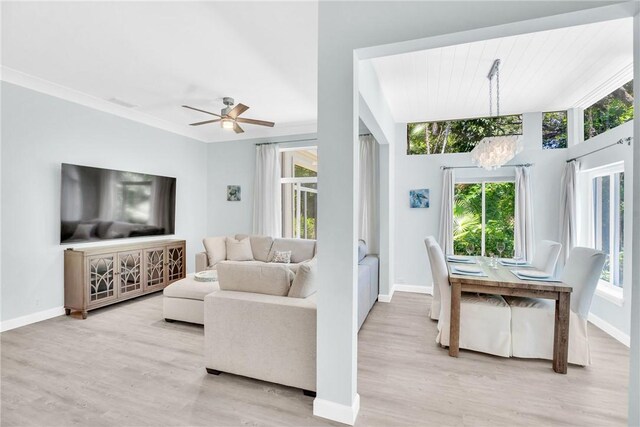 1255 Winding Oaks Cir E Unit 604, Vero Beach, FL 32963 - living room featuring wood finished floors and ceiling fan