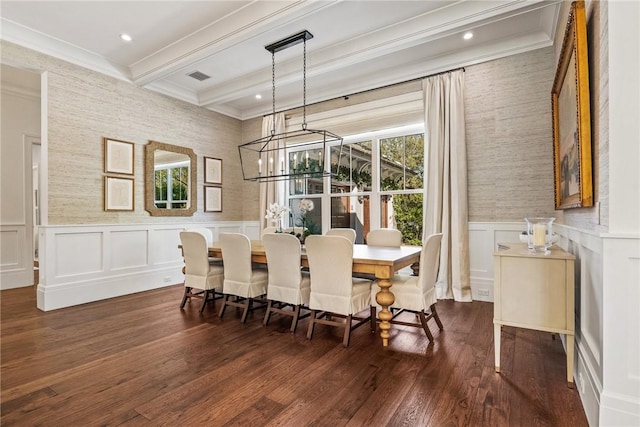 dining space featuring crown molding, beam ceiling, dark hardwood / wood-style floors, and a chandelier