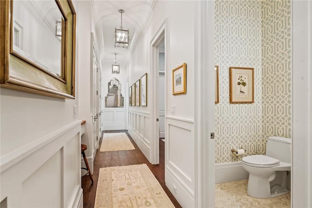 bathroom featuring hardwood / wood-style flooring and toilet