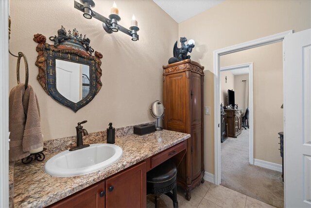 bathroom with vanity and tile patterned floors